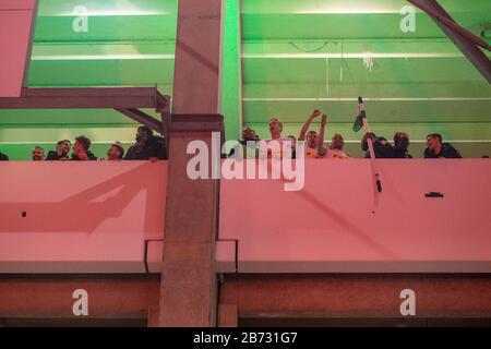 The Borussia Monchengladbach players celebrate the victory, jubilation, cheering, cheering, joy, cheers, celebrate, final jubilation, balcony, balustrade, football 1st Bundesliga, 21st matchday, Borussia Monchengladbach (MG) from an upper tier with the locked-out fans. 1.FC Cologne (K) 2: 1, on March 11th, 2020 in Borussia Monchengladbach/Germany. | usage worldwide Stock Photo