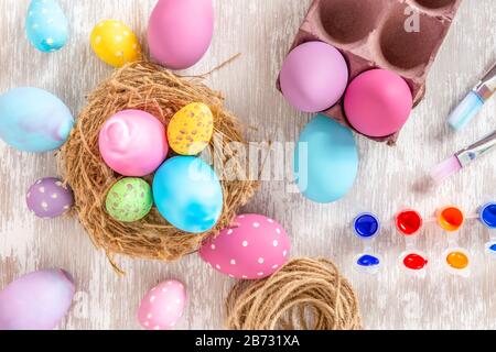 Home made painted easter eggs lay flat concept image - holidays and celebrations. Stock Photo