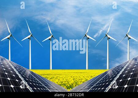 Photo collage of solar panels and wind turbins in the field of crops - concept of sustainable resources Stock Photo