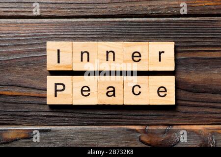 inner peace word written on wood block. inner peace text on table, concept. Stock Photo