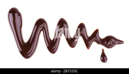 Chocolate syrup drizzle isolated on white background. Splashes of sweet chocolate sauce. Top view. Stock Photo