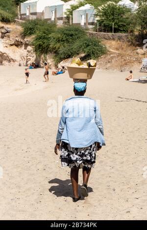 Woman with coconuts in Tarrafal, Santiago Island, Cabo Verde, Cape Verde, green island and Volcano Island, Atlantic, Atlantic Ocean, African style Stock Photo