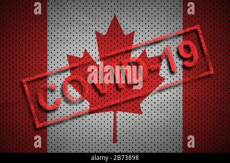 Canada flag and red Covid-19 stamp. Coronavirus 2019-nCov outbreak concept Stock Photo