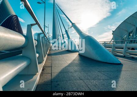 Valencia, Spain - March 5, 2020: Detail of the highest cable-stayed bridge in Valencia, built in steel and through which cars, pedestrians and bicycle Stock Photo