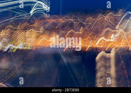 Light painting: Night background with colorful lines of moving objects Stock Photo