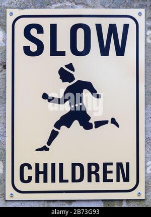 SLOW CHILDREN road warning sign Stock Photo