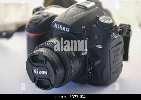 Eskisehir,TURKEY- March 01, 2020: Nikon D7000 Dslr photography camera with Nikkor  50 mm lens on white background. Stock Photo