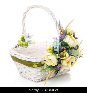 Hand made Easter basket Provence style decorated ribbons, flowers isolated on white background. Stock Photo