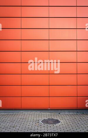 Modern weathered striped red tile wall texture background Stock Photo
