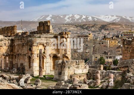 Baalbek roman ruins, temple of Jupiter unesco world heritage, snowcapped mountains Stock Photo