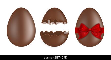 Chocolate easter eggs on white background. Whole egg, broken egg and egg with red bow. Stock Photo