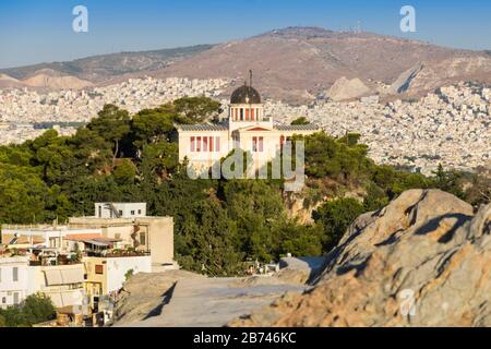 View of Athens from Areopagus. Famous places in Athens - capital of Greece. Ancient monuments. Stock Photo