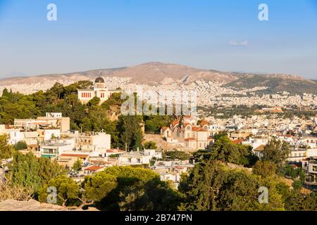 View of Athens from Areopagus. Famous places in Athens - capital of Greece. Ancient monuments. Stock Photo