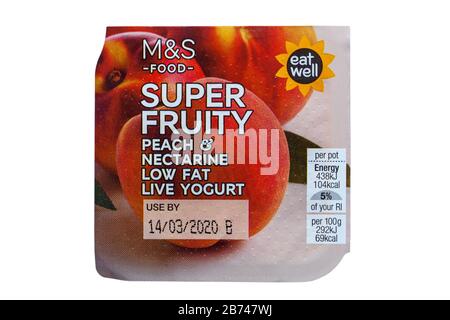 Pot of M&S Super Fruity peach & nectarine low fat live yogurt isolated on white background Stock Photo