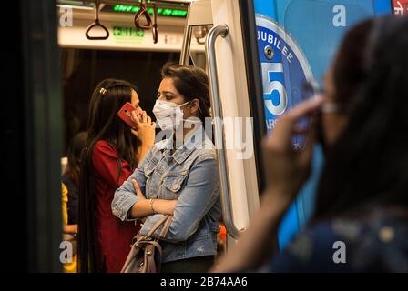 New Delhi, India. 13th Mar, 2020. People wearing masks are seen at a metro station in New Delhi, India, March 13, 2020. The number of the COVID-19 cases in India Friday rose to 81, India's federal health ministry officials said. Credit: Javed Dar/Xinhua/Alamy Live News Stock Photo