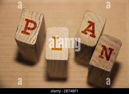 Wooden Blocks with the text: plan. Wood ABC. Business planning concept Stock Photo