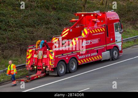 Chorley, Lancashire, UK.  13th March, 2020. Multiple HGV breakdowns on the M6 Motorway.  Multiple HGV breakdowns on the M6 Motorway.   As the efficacy of smart motorways is challenged after 38 deaths in five years after collisions on the hard shoulder. Two HGVS breakdown within 50 yards of each other in Lancashire making for a difficult recovery for Hough Green 24 Hour breakdown rescue service team. Stock Photo