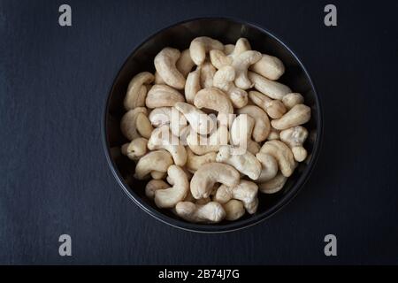 A studio photograph of a bowl of cashew nuts Stock Photo