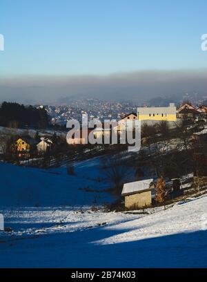Air pollution above the city in winter Stock Photo