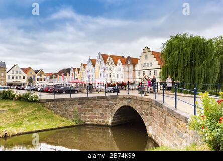 Bridge and historic houses in the center of Friedrichstadt, Germany Stock Photo