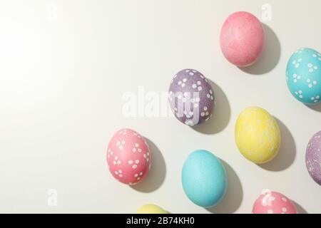 Multicolor Easter eggs on white background, space for text Stock Photo