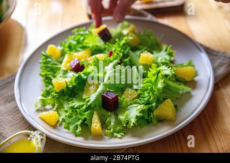 Caesar salad with copyspace on a wooden table Stock Photo