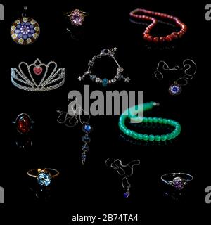 Beautiful jewelry collection on black background. Full size. Stock Photo