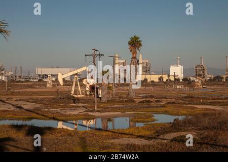 Oil pumpjacks in the Los Cerritos Wetlands, Long Beach, california, USA Stock Photo