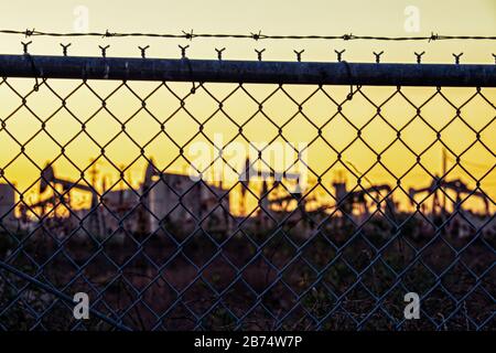 Oil pumpjacks in the Los Cerritos Wetlands, Long Beach, california, USA Stock Photo