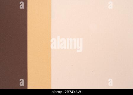 Background from recycled textured paper forming vertical shades of dark brown Stock Photo