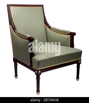 Vintage luxury green sofa Armchair with bronze castings isolated on white Stock Photo