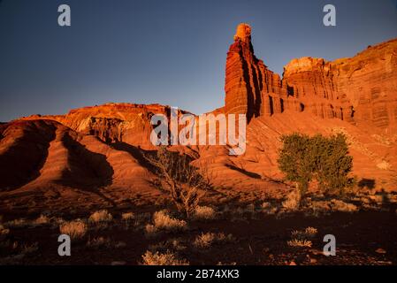 Chimney Rock in Capitol Reef National Park..  This impressive red rock formation is just one of hundreds of rock formations in the park. Stock Photo