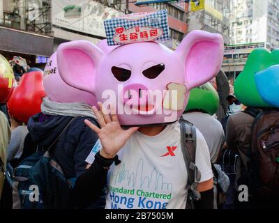 Pro-democracy protesters take part in a march in Hong Kong. Stock Photo