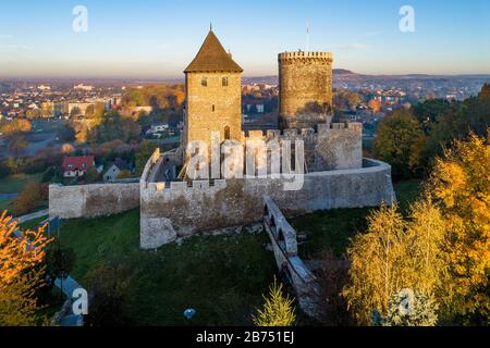 Medieval gothic castle in Bedzin, Upper Silesia, Poland. Aerial view in fall in sunrise light Stock Photo