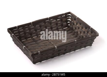 Black empty bamboo wicker tray isolated on white Stock Photo