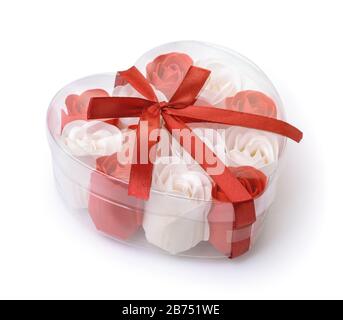 Heart shaped box full of rose soap flowers isolated on white Stock Photo