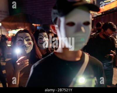 Hongkongers protest on the street after the govenment issues an anti-mask law today. Stock Photo