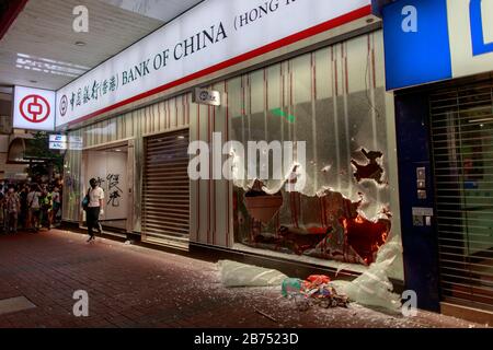 Protesters vandalized Chinese owned shops and MTR in Mongkok. Hongkongers protest on the street after the govenment issues an anti-mask law today. Stock Photo