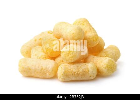 Plie of puffed corn snacks isolated on white Stock Photo