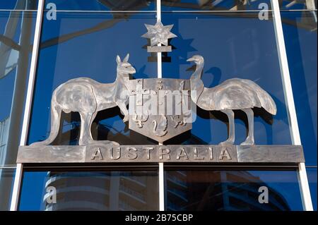 20.09.2018, Sydney, New South Wales, Australia - The national coat of arms of Australia, on which a kangaroo, an emu and a shield are depicted, hangs above the entrance to the Australian National Maritime Museum in Darling Harbour. [automated translation] Stock Photo