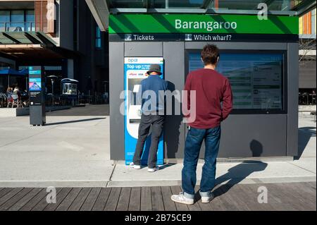 16.09.2018, Sydney, New South Wales, Australia - A man buys a ferry ticket on the boardwalk at Wulugul Walk in Barangaroo South. [automated translation]