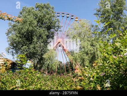 View of the rusting Ferris wheel in the former Spreepark in the Berlin Plaenterwald. In GDR times the playground was a well visited amusement park. Gruen Berlin GmbH will redesign the park. [automated translation] Stock Photo