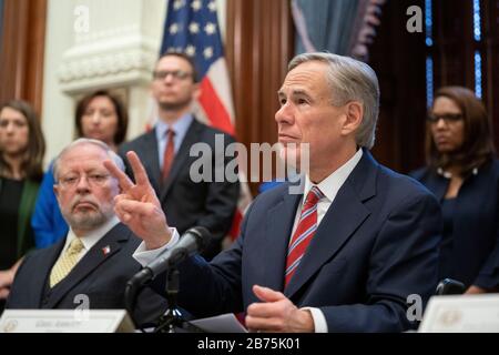 Texas, USA. 13th March, 2020. Texas Gov. Greg Abbott declares a 'state of disaster' in the state during a press conference at his Capitol office in Austin as Texas braces for an onslaught of coronavirus cases.Later in the day, Pres. Donald Trump declared a national emergency while the United States continues to battle spread of the virus. Credit: Bob Daemmrich/Alamy Live News Stock Photo