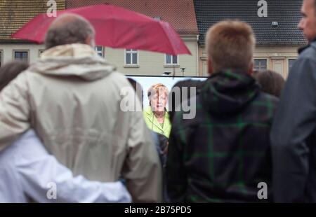 Chancellor Angela Merkel can be seen on a video screen during a CDU election campaign event in Torgau on September 6, 2017. [automated translation] Stock Photo