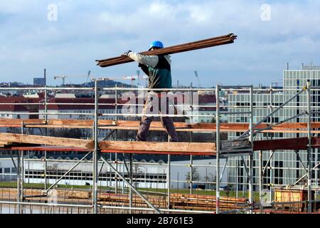 safety on construction sites: roof with lifeline and brick tiles, safety  hook for those who work on the roof, on the upper pitch near the ridge  tiles Stock Photo - Alamy