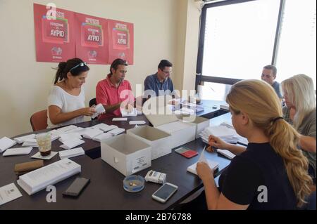 18.09.2015, Thessaloniki / Greece. Election campaign for the parliamentary elections in Greece in September 2015. Syriza - Party members prepare election campaign material. Posters: 'We free ourselves from the old. We win tomorrow'. [automated translation] Stock Photo