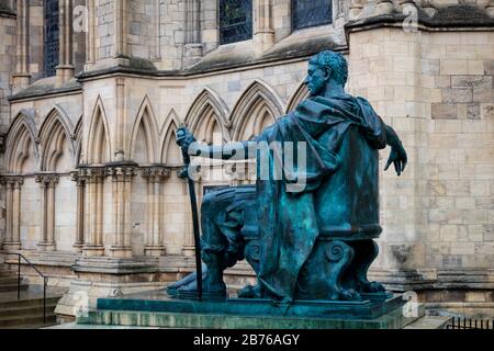 Bronze statue of Emperor Constantine and gothic architecture of York Minster, York, Yorkshire, England, UK Stock Photo