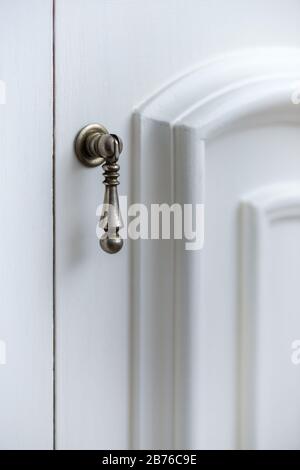 Detail of vintage white cabinet - selective focus, copy space Stock Photo