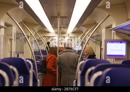 Tourists wait for their destination on an empty train from Schiphol Airport to Central Station on March 13, 2020 in Amsterdam,Netherlands. The Dutch g