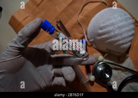 Covid-19 Coronavirus Vaccine - Test isolated on office desk. Healthcare/Medical concept Stock Photo